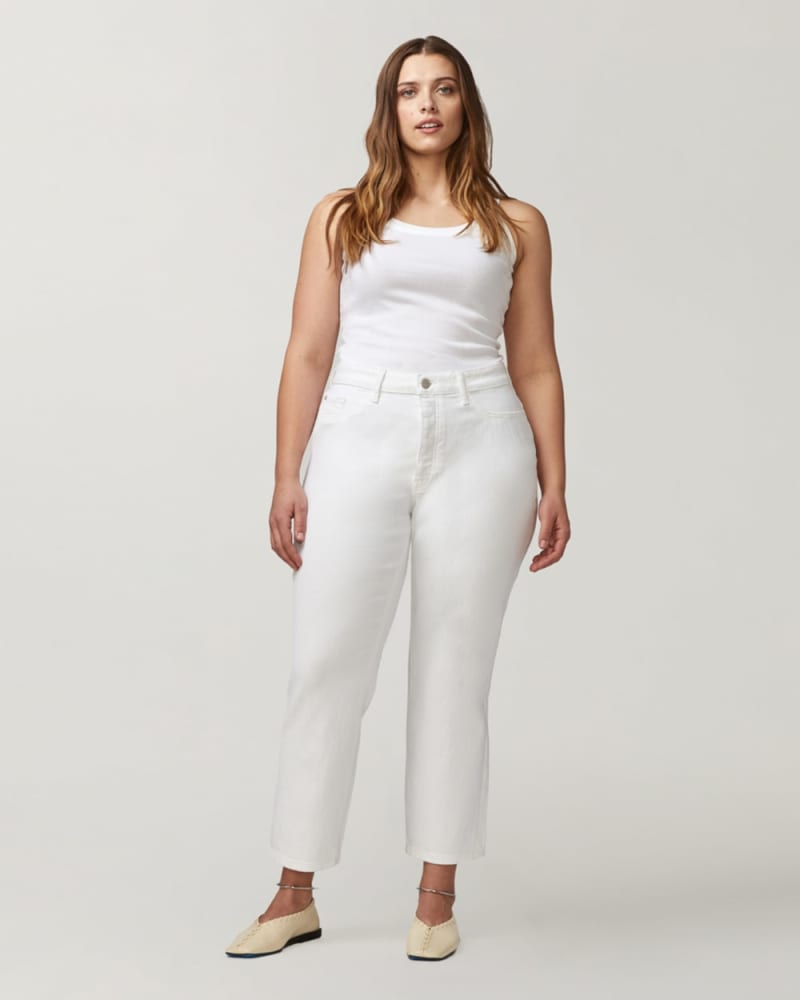 Front of a model wearing a size 14X28 Ariana Straight Leg Jeans in CRANES by Warp + Weft. | dia_product_style_image_id:291781